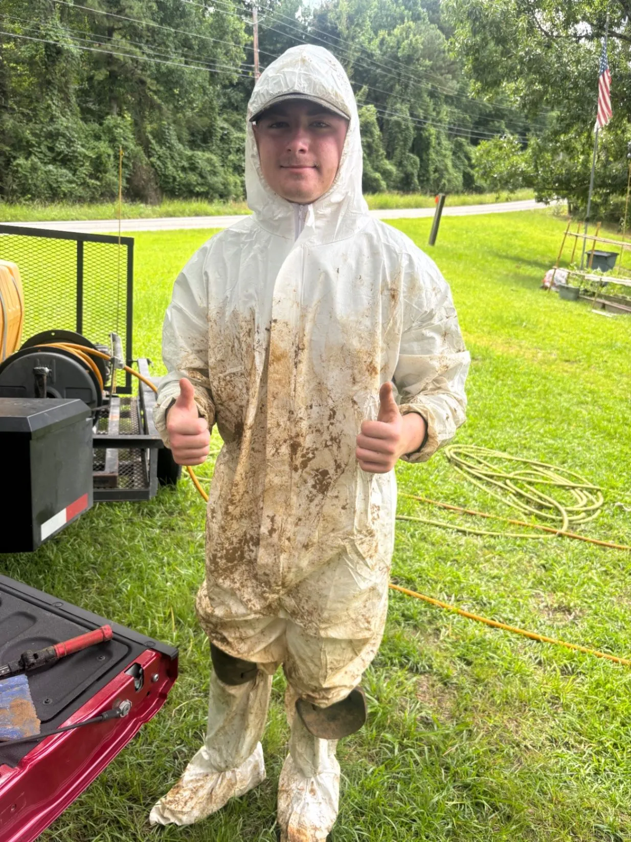 Caleb Kilpatrick after completing a termite treatment beneath a home.